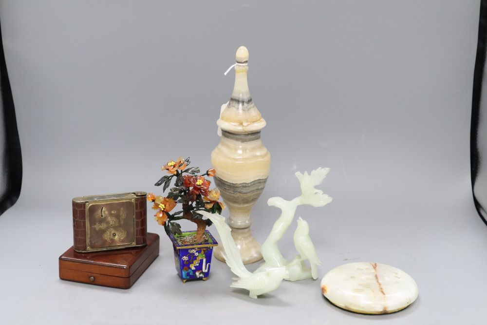 A Chinese hardstone tree, an onyx vase, a broken figure, an alarm clock and a match box